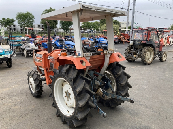 Used Kubota L12402DT Tractor 4WD with front loader from